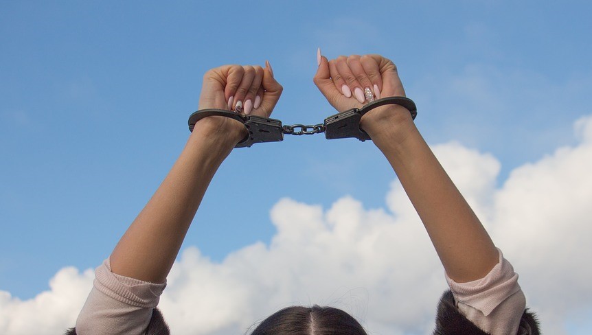 shackles woman handcuffs prison
