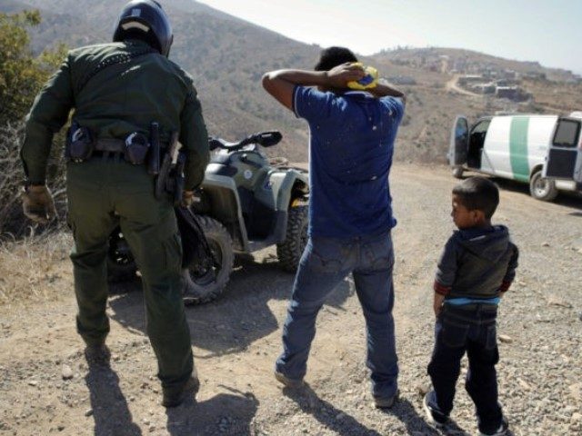 immigration-tolerance-62435-in-28-2018-file-photo-guatemalan-father-son-640x480