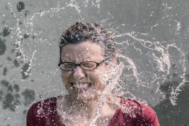 surprise unexepced water splash woman