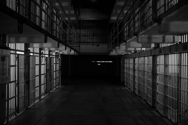 Prison jail dark light Photo by Emiliano Bar on Unsplash