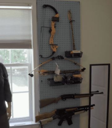 Airsoft and archery on pegboard