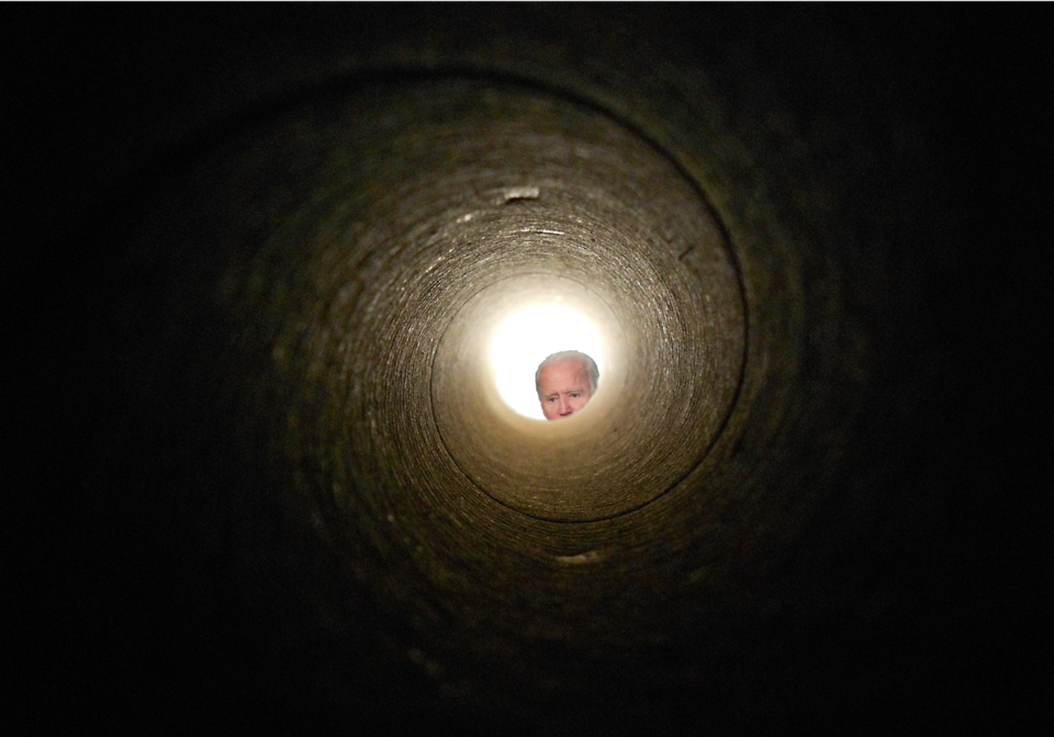 Biden looking down a tube or pipe