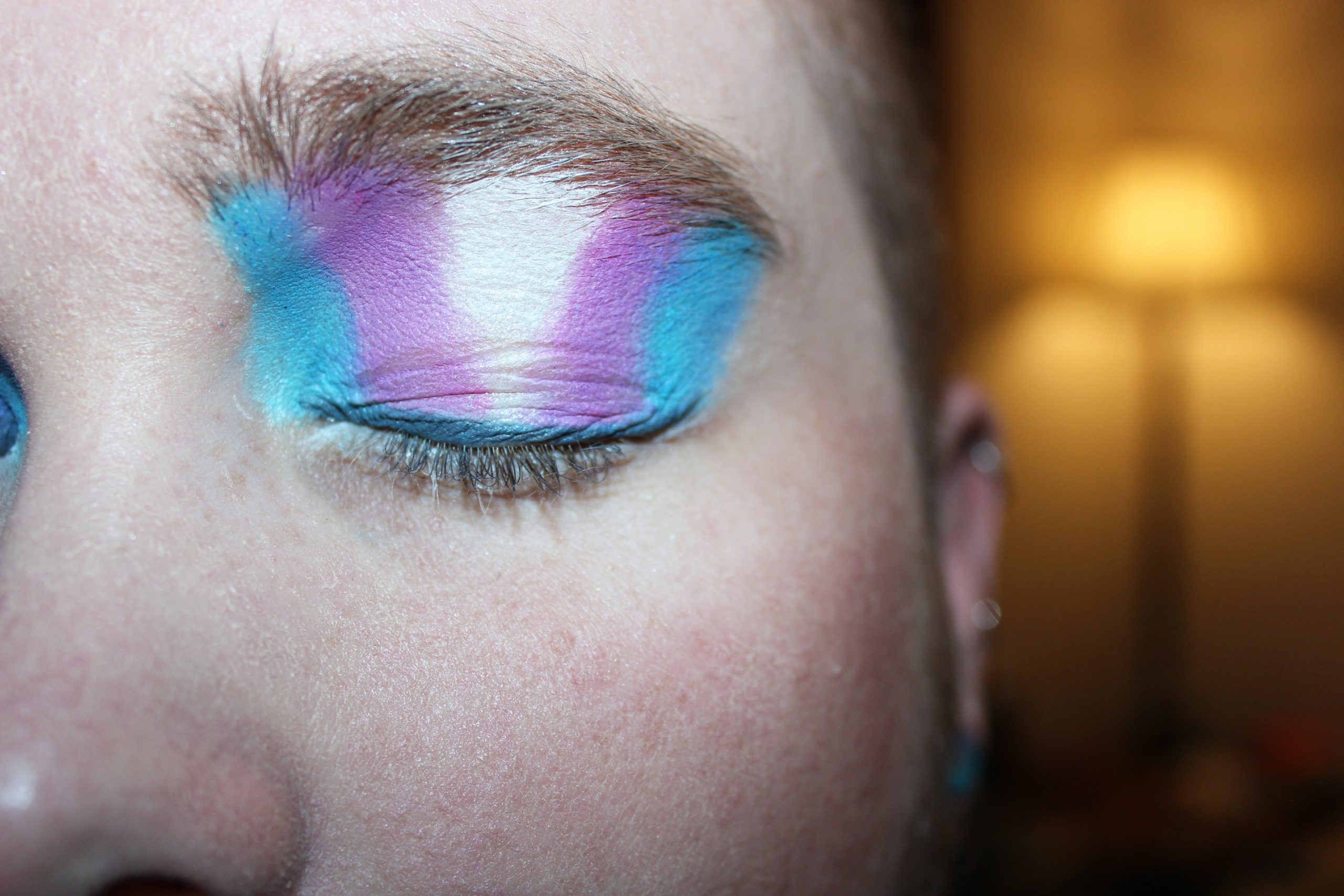 Transgender-flag-colored eye makeup