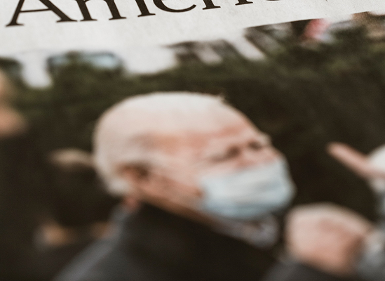 Biden masked Newspaper image Photo by Markus Spiske on Unsplash