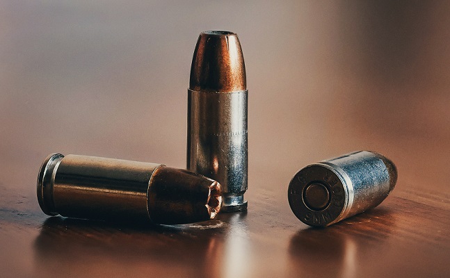 ammo steel casing Photo by Velizar Ivanov on Unsplash