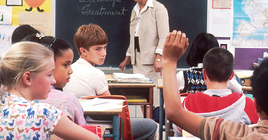 students classroom (no masks) kids teacher Photo by National Cancer Institute on Unsplash