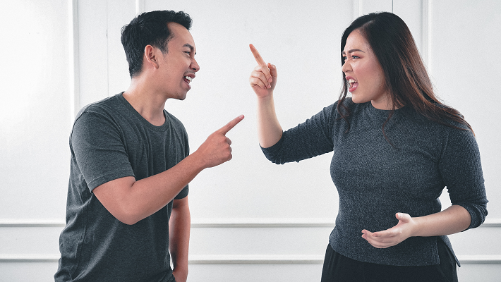 Divided arguing man woman Photo by Afif Kusuma on Unsplash