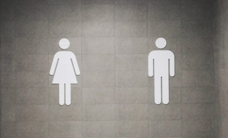 Men women bathroom symbols original Photo by Juan Marin on Unsplash