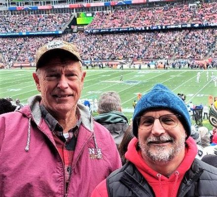 The sports columnist and State Representative Tim Lang by their seats on the 30-yard line at the recent Patriots-Bills game at Gillette Stadium in Foxborough.