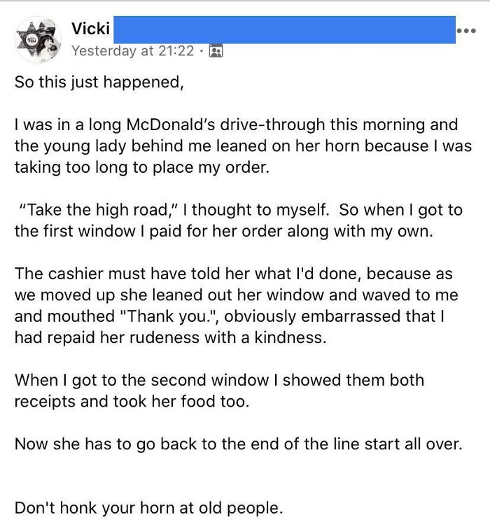 Older woman pays for both food orders and takes both