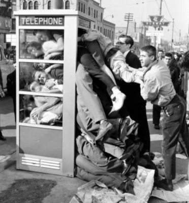 Piling people into a phone booth